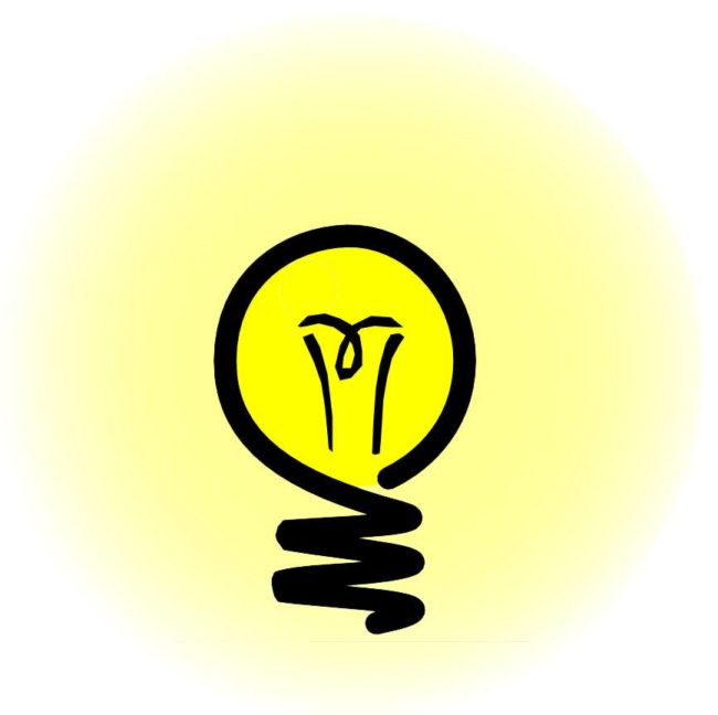 Image of a light bulb illuminated in yellow light.